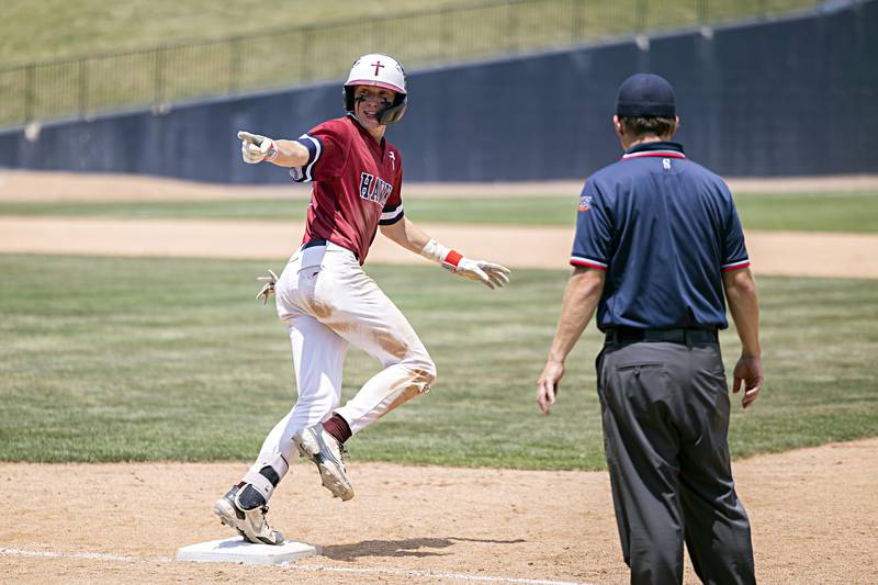 Gibrault’s Hudson Blank gestures to his coach after hitting a home run against Henry-Senachwine Saturday, June 3, 2023 during the IHSA class 1A championship baseball game.