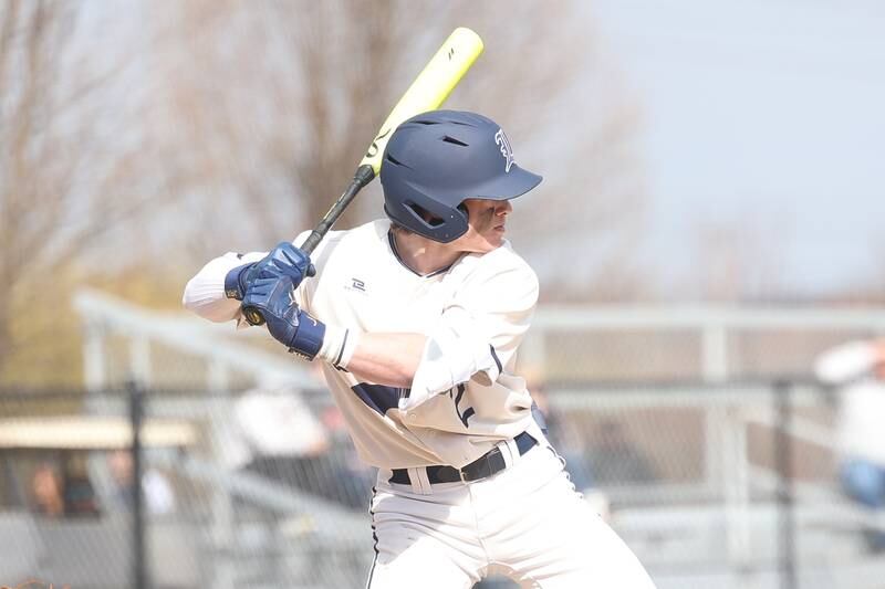 Lemont's Max Michalak locks in on a pitch against Sandburg on Saturday, March 16, 2024.