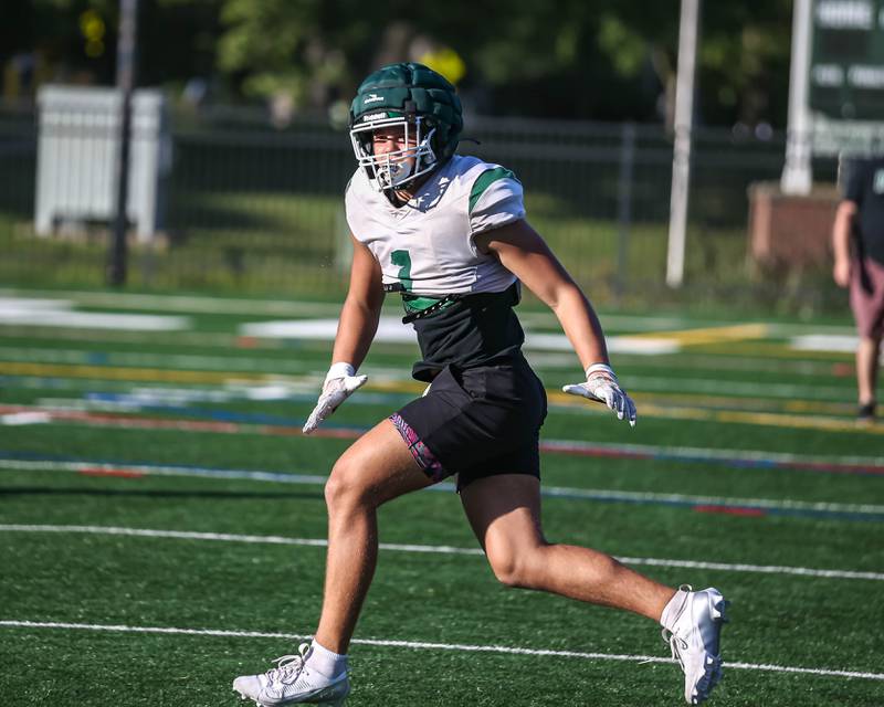 Brady Johnson gets into his route across the middle at Glenbard West football practice, Wednesday, Aug 21, 2025  in Glen Ellyn.