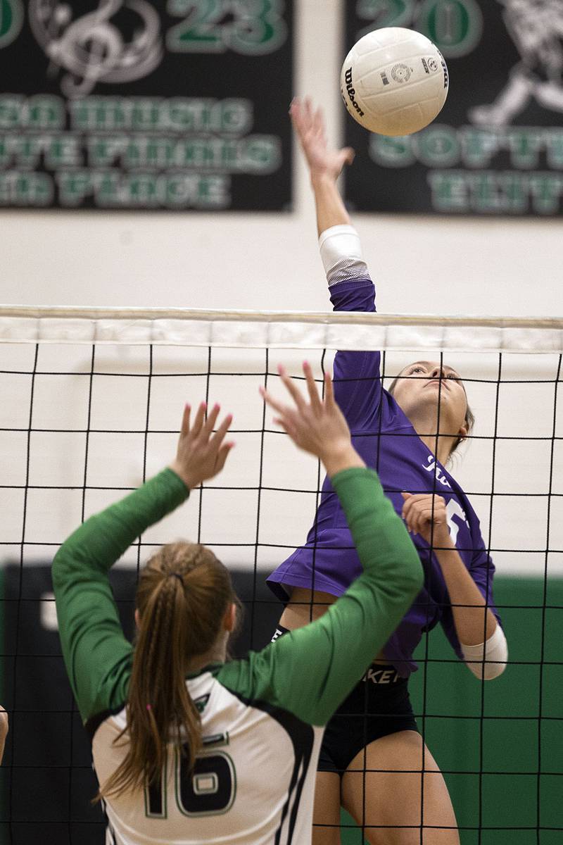 Rochelle’s Audyn Kemp spikes against Rock Falls Monday, Sept. 29, 2025.