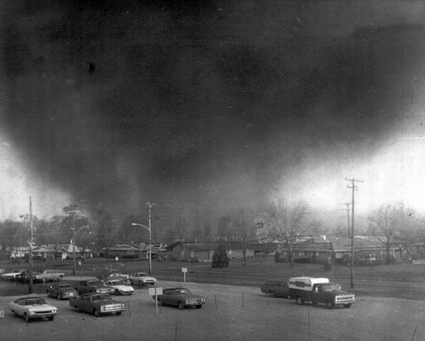A tornado funnel moves through the southeast Pine Crest Garden section of Xenia, Ohio, on April 3, 1974. The deadly tornado killed 32 people, injured hundreds and leveled half the city of 25,000. Nearby Wilberforce was also hit hard. As the Watergate scandal unfolded in Washington, President Richard Nixon made an unannounced visit to Xenia to tour the damage. Xenia's was the deadliest and most powerful tornado of the 1974 Super Outbreak.