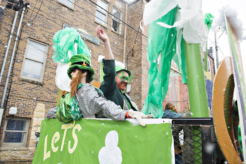 2020 File: You can't keep a good parade down. Mike Lahey waves from a float during the St. Patrick's parade in Dixon.