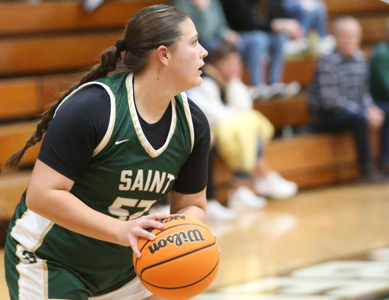 St. Bede's Ava Balestri looks to pass the ball down the court against Marquette during the Tri-County Conference championship game on Thursday, Jan. 23, 2025 at Roanoke-Benson High School.
