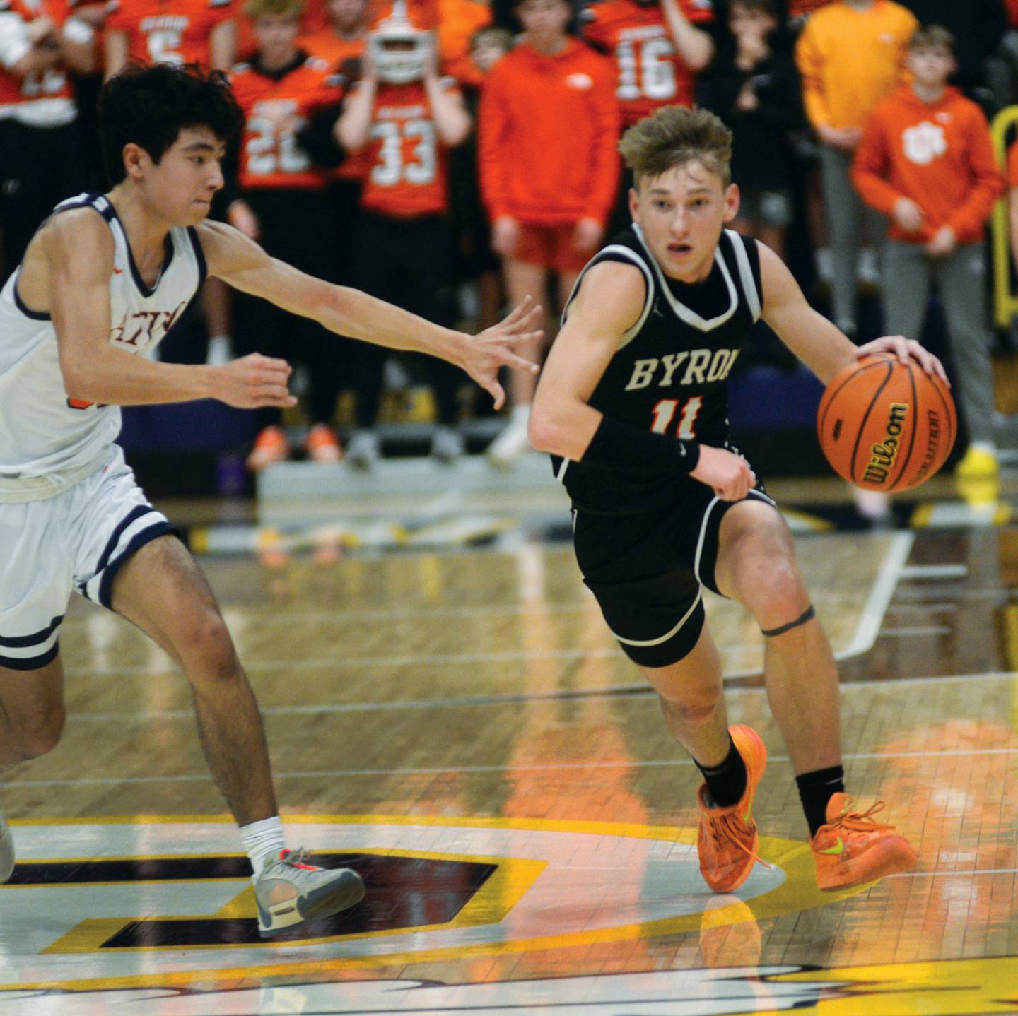 Byron's Cason Newton brings the ball up the court against Chicago Latin at the 2A Supersectional in Sterling on Monday, March 4, 2024. The Tigers beat the Romans 85-71 to advance to the state finals this week in Champaign.