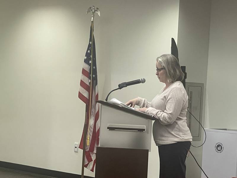 Family Service Agency of DeKalb County executive director Tynisha Clegg addresses the DeKalb Planning and Zoning Commission at its Dec. 1, 2025, regular meeting.