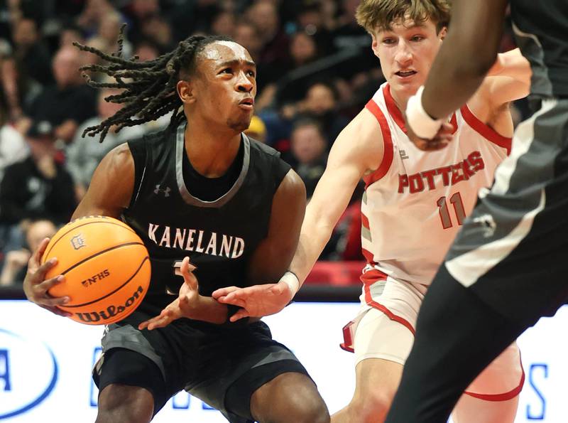 Kaneland's Marshawn Cocroft drives against Morton's Owen Adams Monday, March 9, 2026, during their IHSA Class 3A supersectional matchup in the Convocation Center at Northern Illinois University in DeKalb.