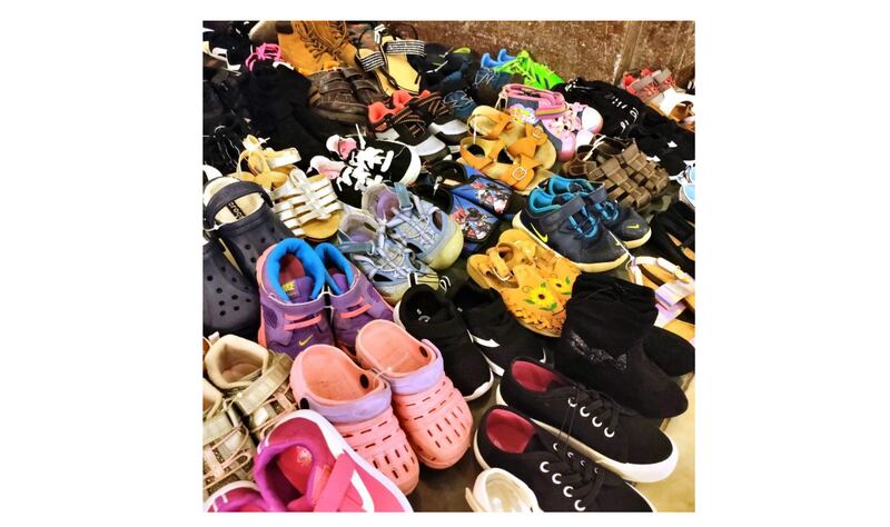 A display of 347 pairs of children's shoes at the Illinois Capitol Thursday aimed to call attention to the plight of abused children. The number represents the children who died from 2019 through 2021 though despite having had some contact with DCFS