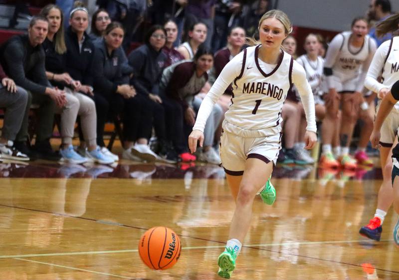 Marengo’s Myah Broughton leads a fast break against Woodstock North in varsity girls basketball on Tuesday, Dec. 2, 2025, at Marengo High School in Marengo.