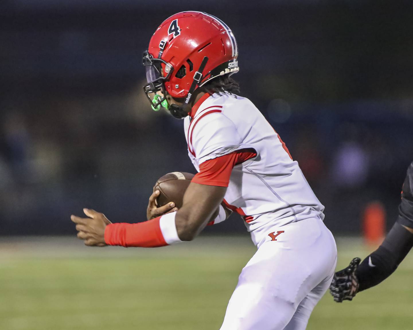 Yorkville's Jayden Ruth (4) takes off to the endzone after catching a short pass during football game between Yorkville at Plainfield East Friday, Sept 19, 2025 in Plainfield.