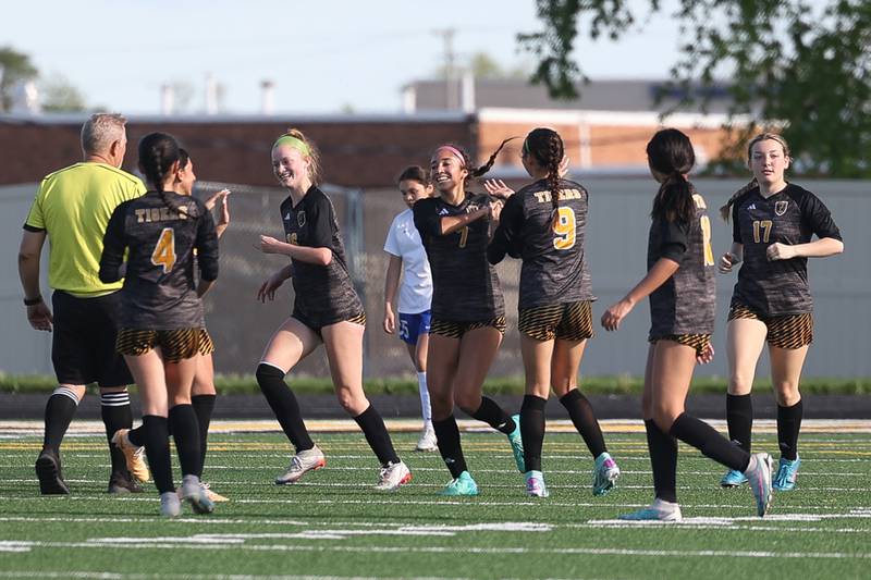 Joliet West’s Alicia Casillas, 7, celebrates with her teammates after her third goal in the first half against Joliet Central on Tuesday, April 29, 2024.