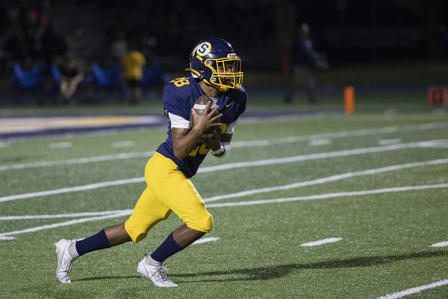 Sterling’s Marice De La Cruz takes a punt against Quincy Friday, Oct. 17, 2025.