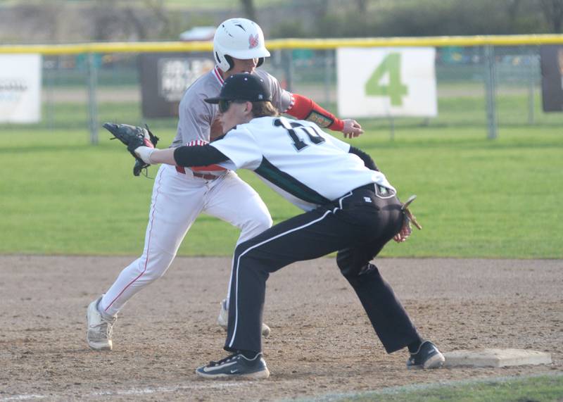 Oregon's Avery Lewis heads back to first as Rock Falls' Owen Laws waits for the throw during a Monday, April 21, 2025 game at Oregon High School.