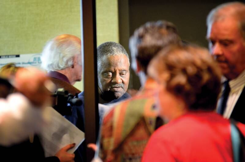 Lee County board member Marvin Williams speaks to media outside of the Dixon City Council chambers September 20, 2012 after the state's attorney announced the indictment of former Dixon comptroller Rita Crundwell.