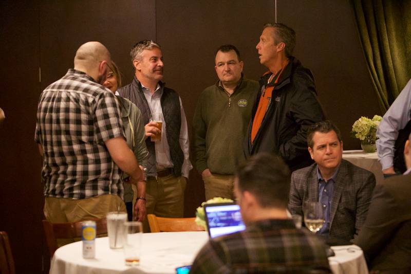 Downers Grove Mayor Bob Barnett gathers with supporters as poll results come in at Emmett's Brewing on Tuesday, April 4,2023 in Downers Grove.