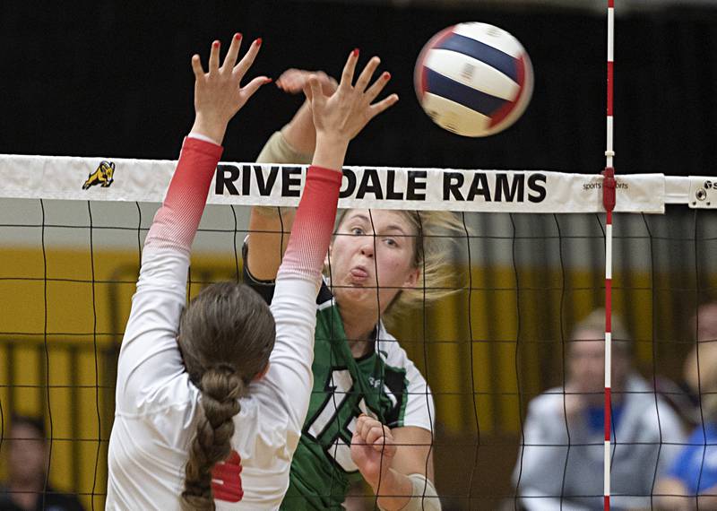 Rock Falls’ Claire Bickett hammers a shot for a kill against Oregon Tuesday, Oct. 24, 2023 at the Riverdale volleyball regional.