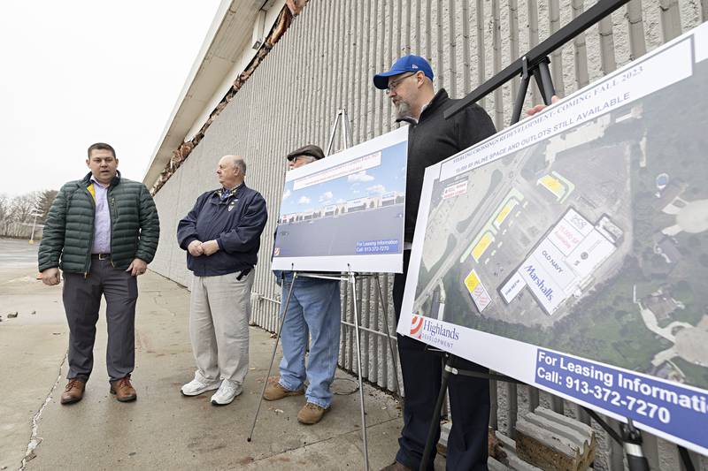Investor Chris Williams (left) speaks outside of the former K-Mart building. Williams is redeveloping the site with several big name clients signing leases. Old Navy, Marshalls and Five Below have all signed on to take space at the shopping center.