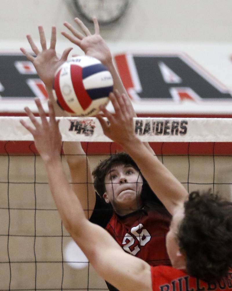 Huntley’s Mac Nagle tries to block the hit from Grant’s Ethan Henney during a nonconference boys volleyball match on Thursday, May 21, 2026, at Huntley High School.