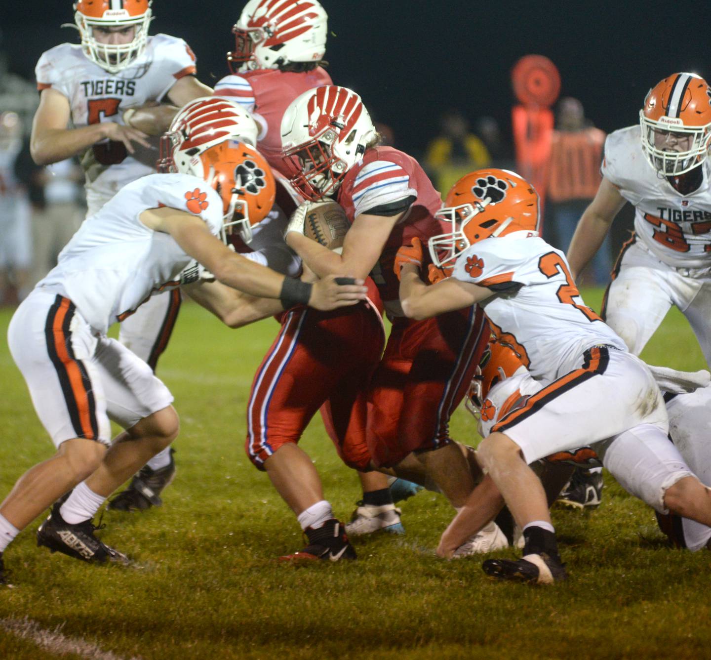 Oregon running back Luke Weems (7) is tackled by Byron defenders during Friday, Sept. 22, 2023 action at Landers-Loomis Field.
