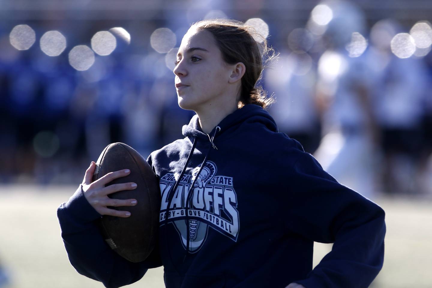 Sophia Seaburg runs wit the football after retrieving the ball during a IHSA Class 6A semifinal playoff football game on Saturday, Nov. 18, 2023, at Lake Zurich High School.