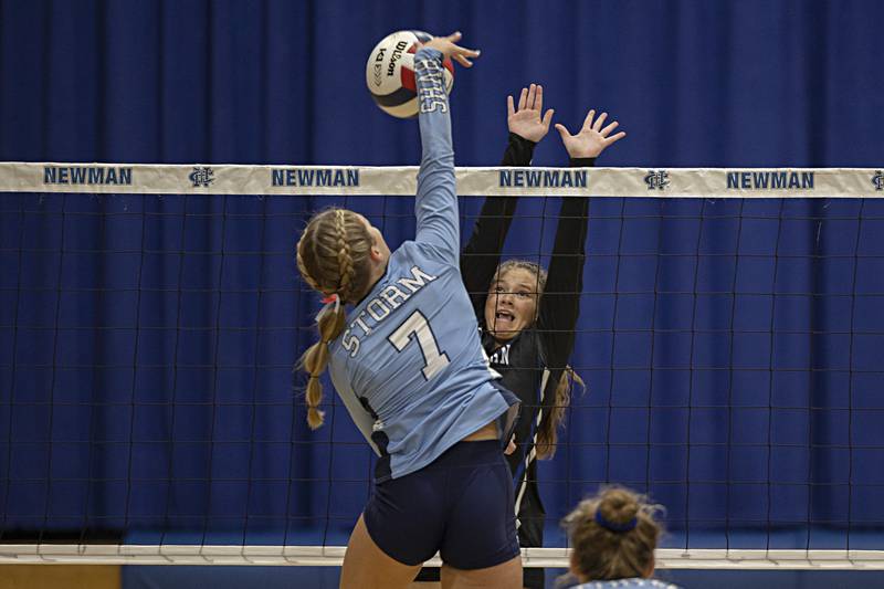 Newman’s Lucy Getting goes up to block a shot by Bureau Valley’s McKinley Canady against Bureau Valley Thursday, Sept. 28, 2023 at Newman.