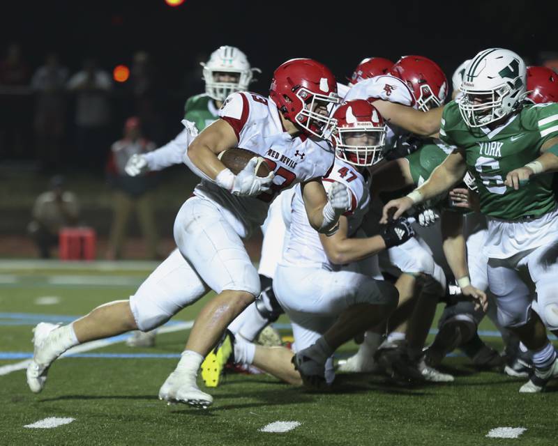 Hinsdale Central's Sean Allison (33) scores a big late touchdown during football game between Hinsdale Central at York. Oct 8, 2021.