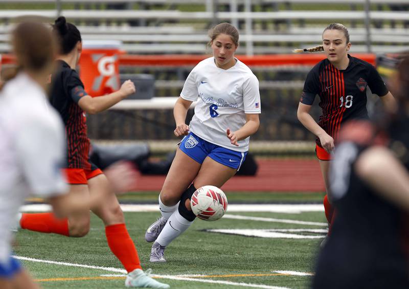 St. Charles North's Maddie Room (6) moves the ball to a teammate during the championship game of the Rose Augsburg Drach Invitational Saturday, March 29, 2025 in St. Charles Ill.