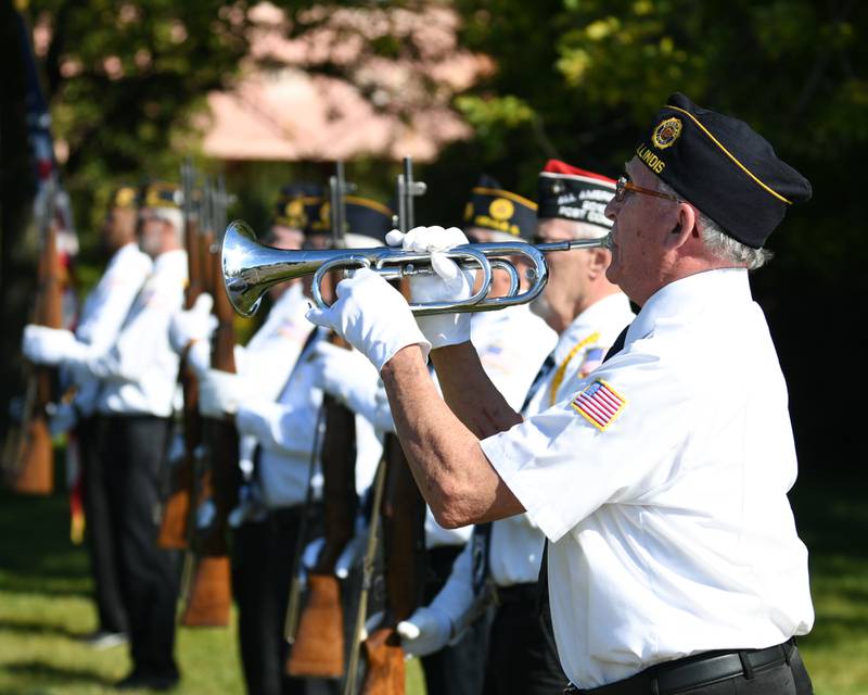 Denny Vaupel plays "Taps" on the bugle during a dedication ceremony marking the completion of phase one of the DeKalb Elks Veteran’s Memorial Plaza in DeKalb Saturday, Oct. 1, 2022.