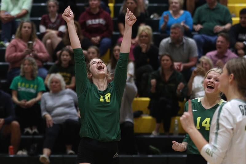 Crystal Lake South’s Grace Meyer and the Gators roar during their three-set win over Prairie Ridge in varsity volleyball at Crystal Lake South Tuesday night.