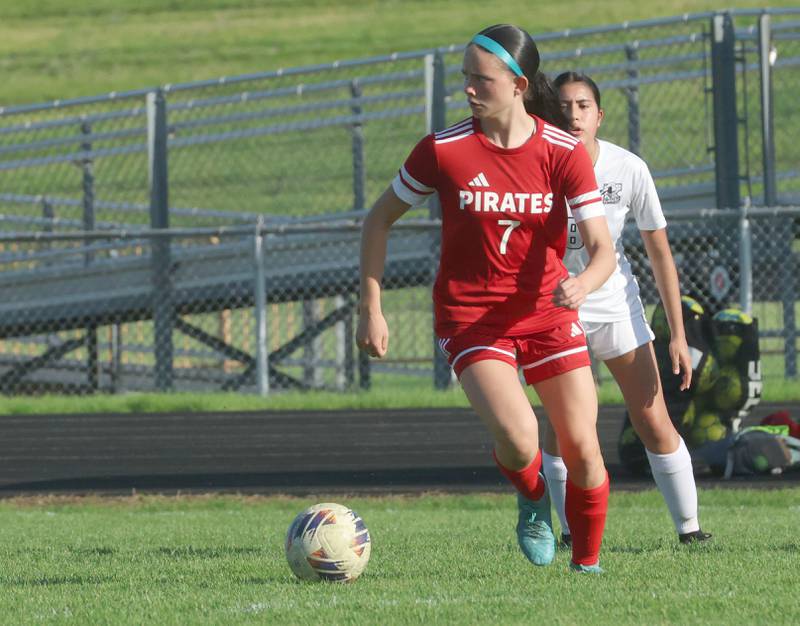Ottawa's Georgia Kirkpatrick looks to pass the ball down the field on Wednesday, April 22, 2026 on King Field at Ottawa High School.