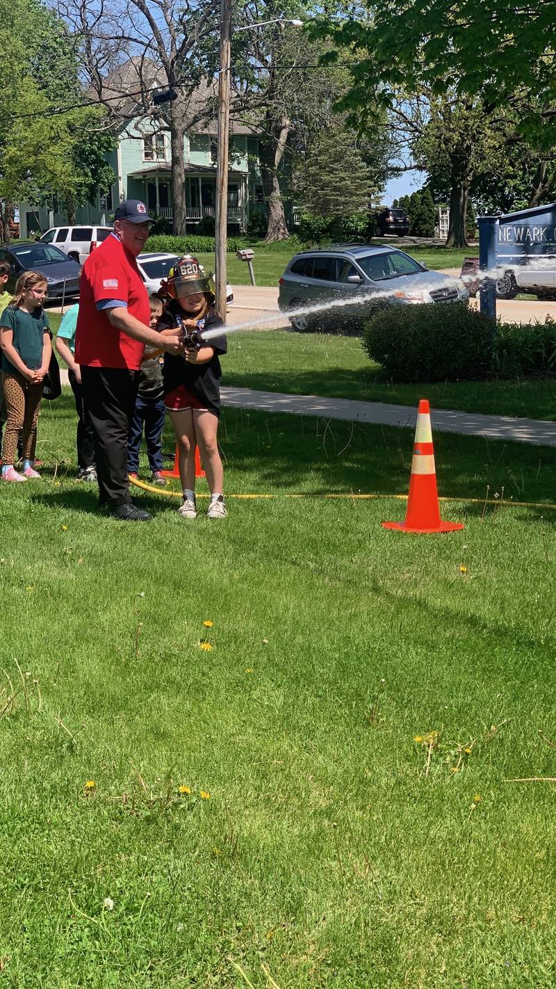 Newark Grade School participated in Camp 911 on May 9, a program begun in 2015 by retired Newark School District nurse Karen Sapsford. Firefighters and EMTs from the Newark Fire Department along with deputies from the Kendall County Sheriff's Office brought their equipment to show students, while nurses from Rush Copley Medical Center in Yorkville taught students first aid.