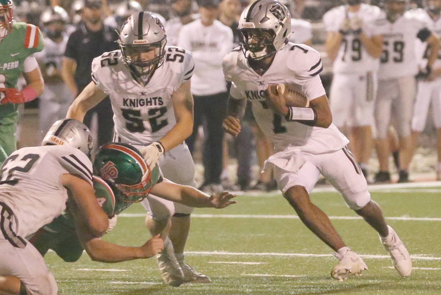 Kaneland quarterback Jalen Carter runs the ball against L-P on Friday, Oct. 17, 2025 at Howard Fellows Stadium.