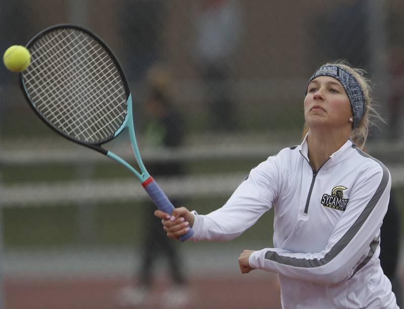 Sycamore’s Jetta Weaver returns the ball Thursday, Oct. 20, 2022, during during the first day of the IHSA State Girls Tennis Tournament at Schaumburg High School in Schaumburg.