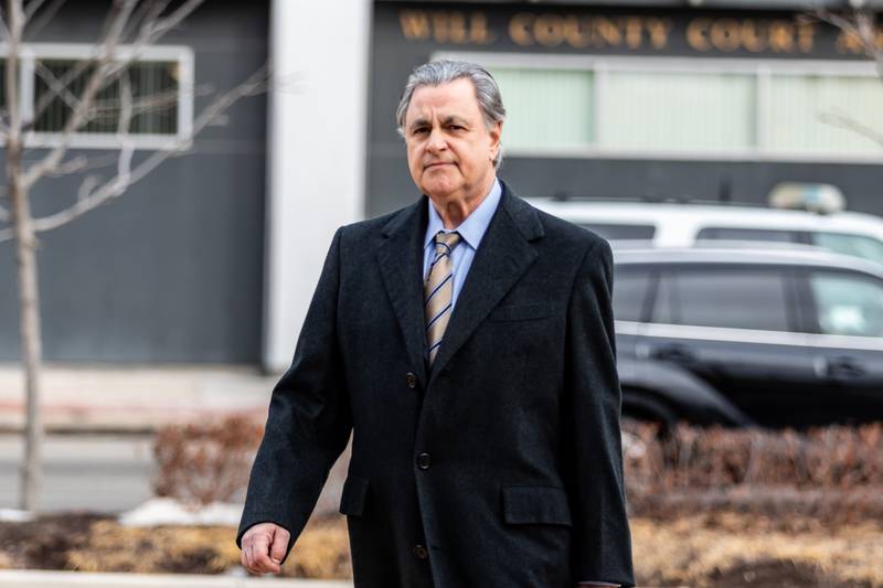 Defense attorney George Lenard arrives at the Will County Courthouse in Joliet on Feb. 24. for the first day of the trial against Joseph Czuba.