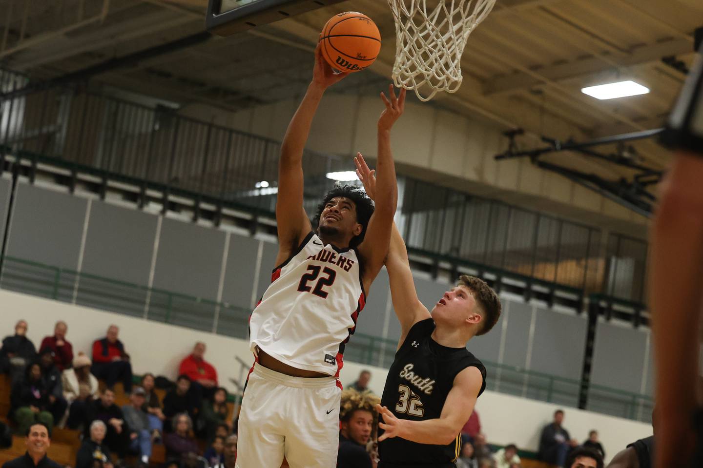 Bolingbrook’s JT Pettigrew puts up a shot against Hinsdale South in the 50th Annual Jack Tosh Holiday Classic on Thursday, Dec. 26, 2024 at York High School.
