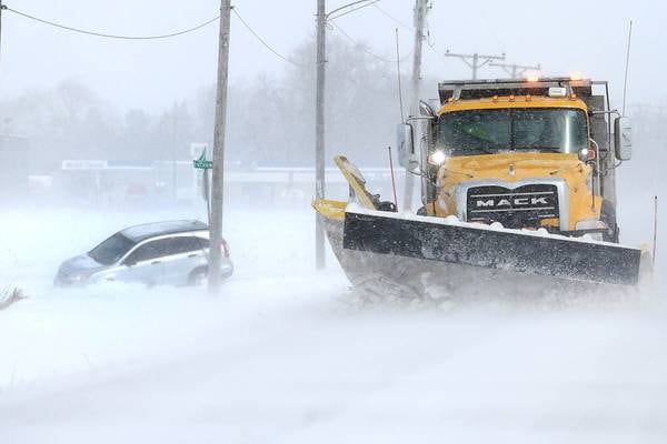 Photos: March snowfall, wind cause hazardous travel conditions in DeKalb County