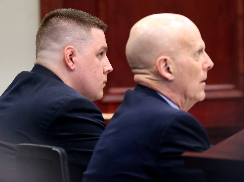 Former police officer James Corralejo (left) and his attorney Gary Johnson listen to instructions from Circuit Court Judge Philip Montgomery Thursday, July 17, 2025, at the DeKalb County Courthouse in Sycamore. Corralejo was sentenced to four years in prison for a Class 2 felony count of driving under the influence of alcohol causing death for a 2023 crash that killed DeKalb woman Graciela Reza Contreras.