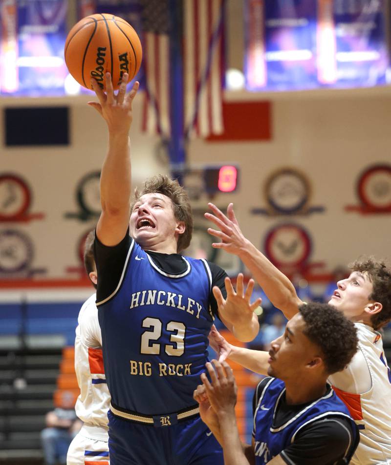 Hinckley-Big Rock's Luke Badal gets a shot in front of the Genoa-Kingston's defense Tuesday, Jan. 6, 2026, during their game at Genoa-Kingston High School.