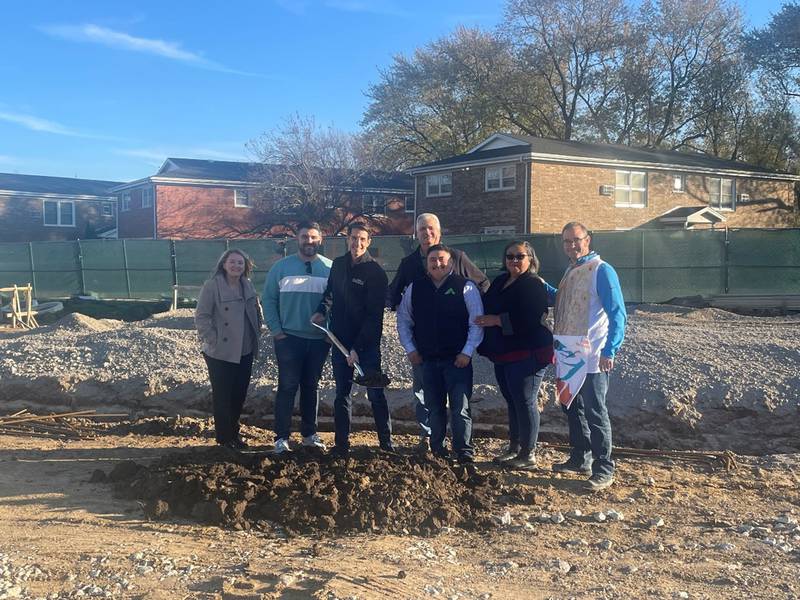 Genoa City Manager Alyssa Seguss, Fourth Ward Alderman Gary Roca, Mayor Jonathon Brust, Taco Bell Director of Operations Tim Martens, Market Coach Cesar Almaras and Areas Coach Alejandra Maruri pose for a photo on Nov. 9, 2023, when the ground was broke for the Genoa Taco Bell location.