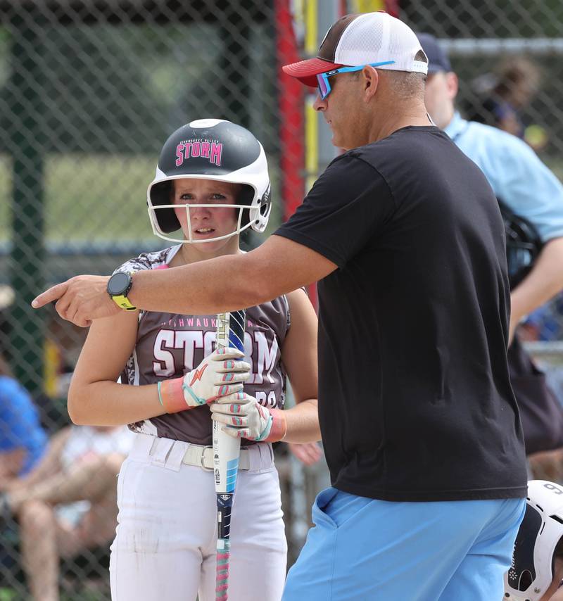 Kishwaukee Valley Storm's Kaylee Knabe talks to her coach Friday, June 27, 2025, during their 16u game against Northern Ice in the Storm Days tournament at the Sycamore Community Sports Complex.