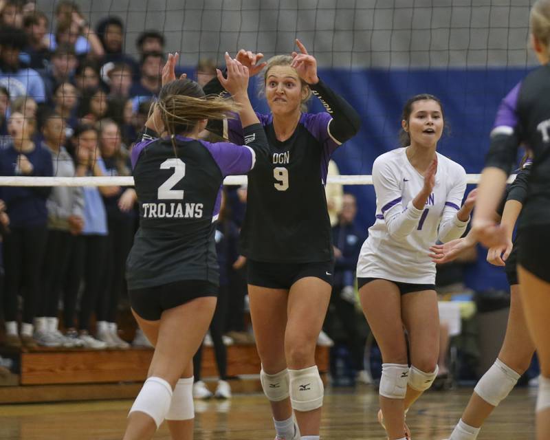 Downers Grove North celebrates their first set win during Class 4A Lyons Sectional Semifinal volleyball match between Downers Grove South at Downers Grove North. Nov 4, 2025 in La Grange.