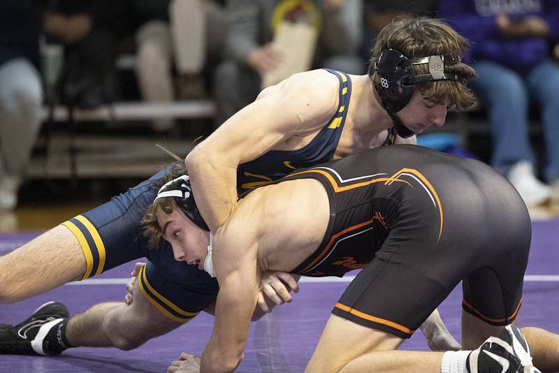 Sterling’s Jonah’s Tyne works against Freeport’s Thomas Olson Tuesday, Jan. 13, 2025, in a triangular meet at Dixon High School.