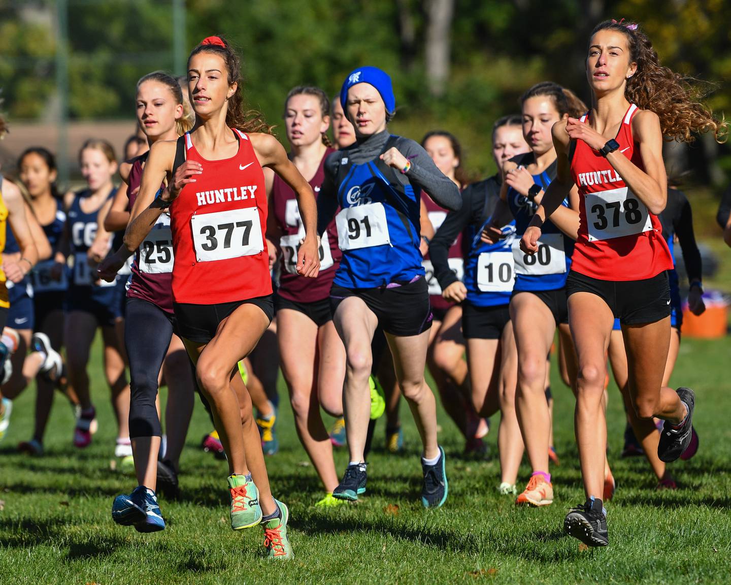 Huntley's Breanna Burak leads the field at the start of the the Fox Valley Conference girls cross country meet at Veteran Acres Park on Saturday, Oct. 15, 2022 in Crystal Lake.