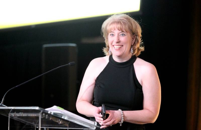 Linda Strohschein of the Strohschein Law Group reacts to being named the 2022 L.E.A.P. Award winner during the 100th Annual Charlemagne Gala at the Q Center in St. Charles on Friday, May 13, 2022.