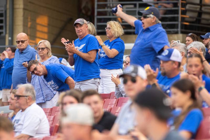 Newman Central Catholic Fans cheer after an RBI during a game against Hope Academy at Northwestern Medicine Field in Geneva on Monday, June 2, 2025.