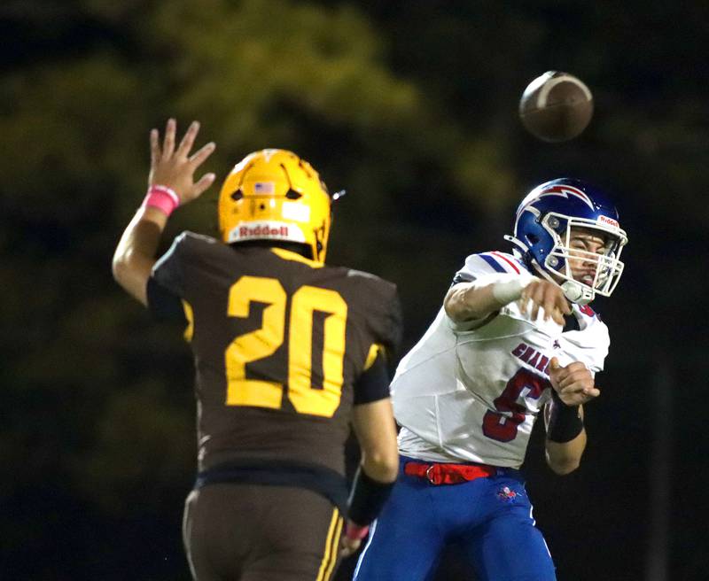 Jacobs’ Blake Koziel, left, closes in as Dundee-Crown’s Isaac Grzynkowicz fires a pass in varsity football  at Jacobs High School in Algonquin on Friday, Oct. 10, 2025.