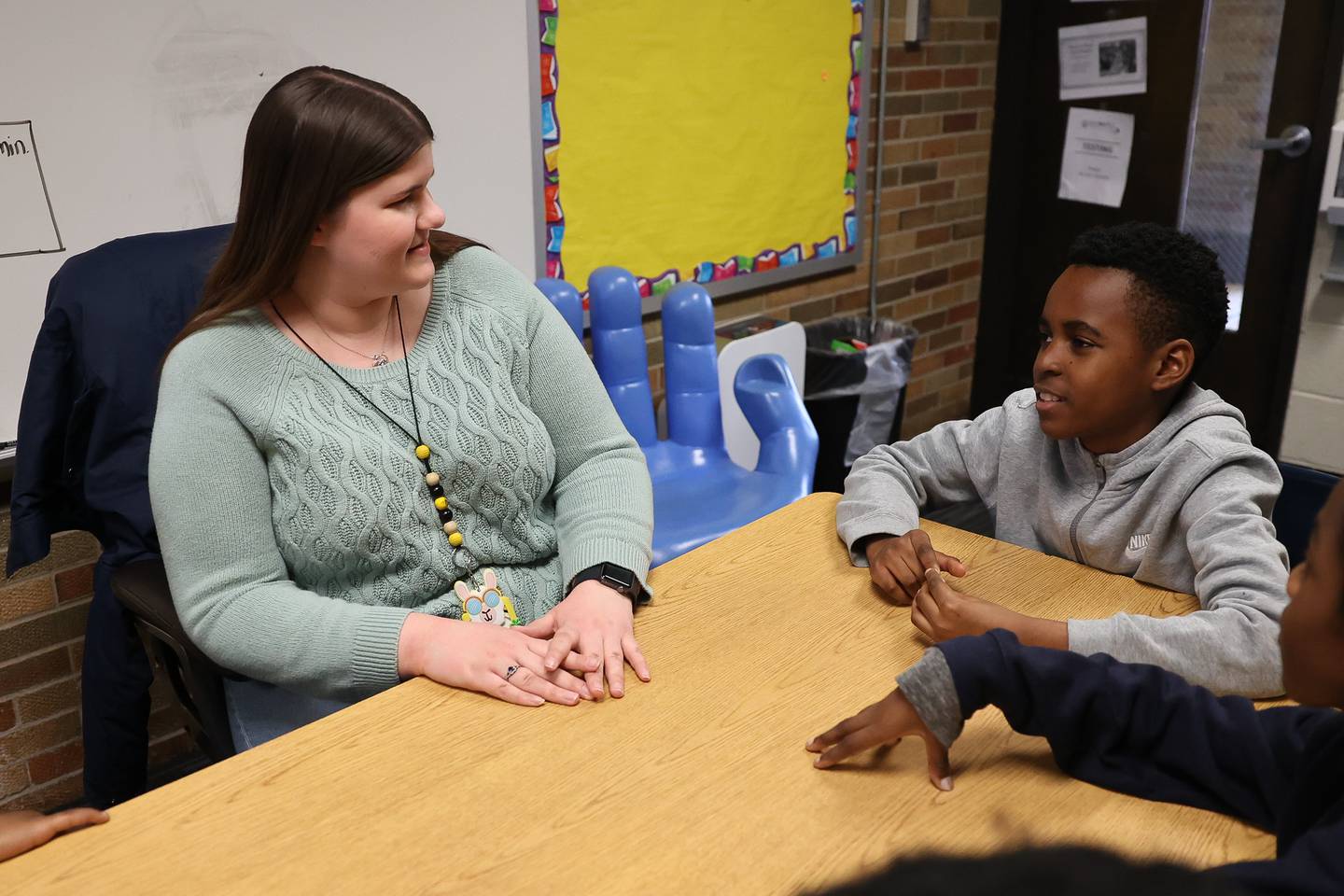 French EL teacher Kira Cloonan works with 4th grader Ryan Marshall Djonga Kameni at Carl Sandburg Elementary in Joliet.