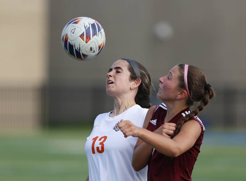 Crystal Lake Central's Jordin Gaunaurd (13) heads the ball during the 2A girl's varsity supersectional soccer match between Crystal Lake South and St. Ignatius high schools on Tuesday, June 3, 2025 in Chicago.