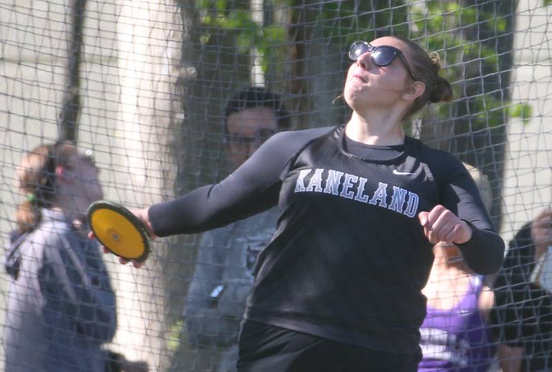 Kaneland's Kyla Schultz throws discus during the Interstate 8 Conference girls track championship on Friday, May 9, 2025 at Morris High School.