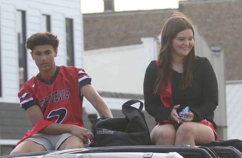 Hall homecoming king candidate Cameron Allison and queen candidate Julia Dergance ride during the Homecoming parade on Thursday, Sept. 18, 2025 downtown Spring Valley.