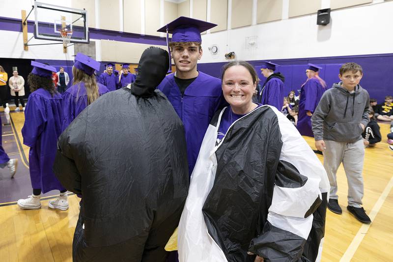 Dixon senior Dominic Beck poses with Jaylee Dugger (left) and mom Sarah Wilson Wednesday, May 21, 2025.